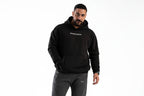 Man wearing a black hoodie with 'BOOSTER' logo on a white background

