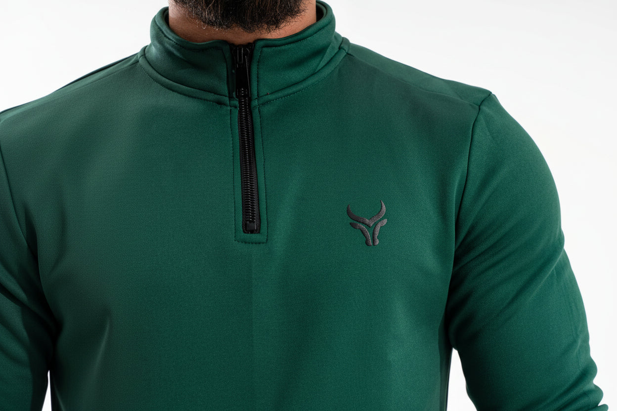 Green pullover with a logo on a white background