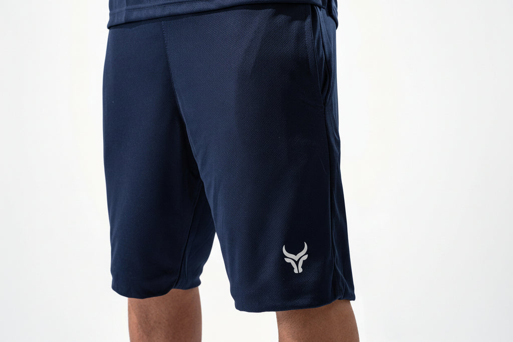 Navy blue shorts with a logo on a white background