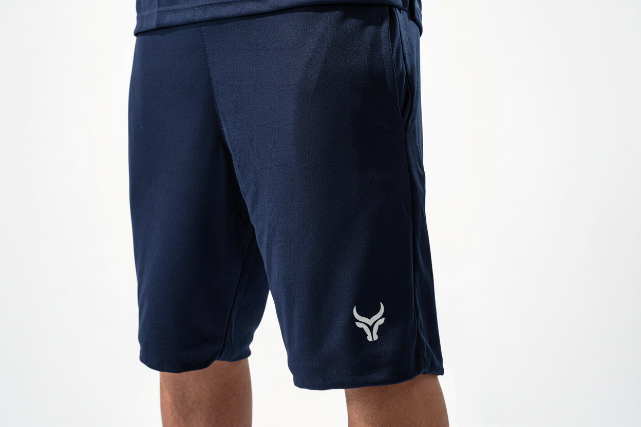 Navy blue shorts with a logo on a white background