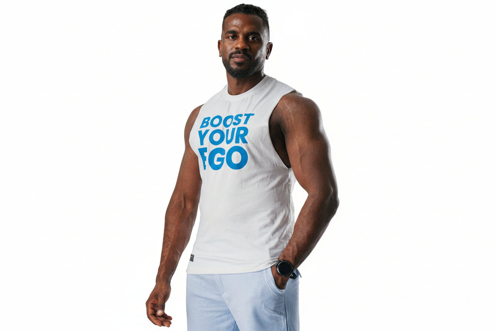 Man wearing a white sleeveless shirt with blue text on a plain background

