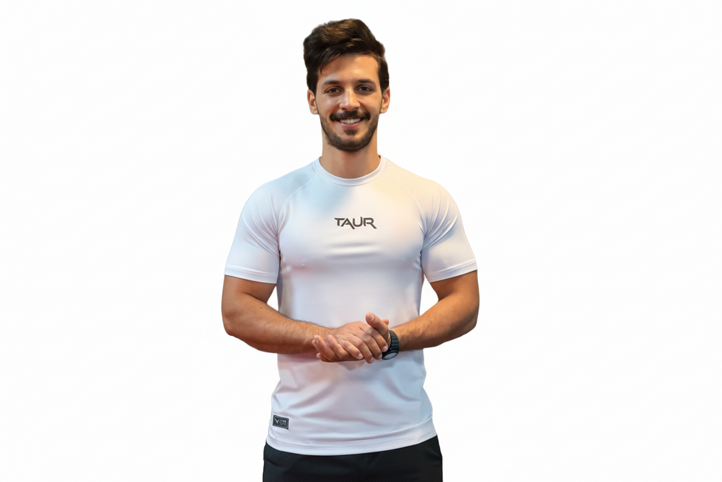 Man wearing a white t-shirt with 'TAUR' logo on a white background
